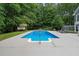 Sparkling in-ground pool offers a refreshing escape on warm days, complete with ladder and diving area at 9125 Patrick Pl, Winston, GA 30187