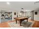 Recreation area featuring a pool table, billiard accessories, an exercise area and a beautiful area rug at 9125 Patrick Pl, Winston, GA 30187
