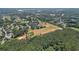 Expansive aerial view overlooking the golf course and neighborhood in a serene, green setting at 2429 Kirk Nw Ln, Kennesaw, GA 30152