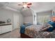 Bedroom features vaulted ceilings, plush carpet, and a large window with great natural light at 2429 Kirk Nw Ln, Kennesaw, GA 30152