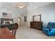 Large bedroom has vaulted ceilings, neutral walls, and carpeted floors plus a full view of the ensuite at 2429 Kirk Nw Ln, Kennesaw, GA 30152