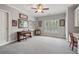 Bright bedroom featuring a piano, neutral walls, crown molding, and a large window offering ample natural light at 2429 Kirk Nw Ln, Kennesaw, GA 30152
