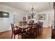 Spacious dining room featuring hardwood floors, decorative chandelier, and elegant details at 2429 Kirk Nw Ln, Kennesaw, GA 30152