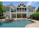 Stunning home exterior with a pool, patio, and beautiful landscaping at 2429 Kirk Nw Ln, Kennesaw, GA 30152