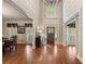 Elegant foyer featuring hardwood floors, transom window, and access to formal dining area at 2429 Kirk Nw Ln, Kennesaw, GA 30152
