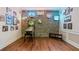 Finished game room with hardwood floors and vintage brick with beer memorabilia at 2429 Kirk Nw Ln, Kennesaw, GA 30152