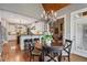 Kitchen and breakfast nook with stainless steel appliances, breakfast bar, and wooden table at 2429 Kirk Nw Ln, Kennesaw, GA 30152