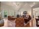 Comfortable living room features vaulted ceilings, abundant seating, and a cozy fireplace at 2429 Kirk Nw Ln, Kennesaw, GA 30152