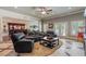 Relax in this inviting living room with tile and wood floors and an adjacent wet bar at 2429 Kirk Nw Ln, Kennesaw, GA 30152