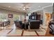This relaxing space features ample seating, a TV, eye-catching floors, and bright, natural light at 2429 Kirk Nw Ln, Kennesaw, GA 30152