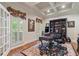 A spacious office with large windows, plantation shutters, and custom millwork at 2429 Kirk Nw Ln, Kennesaw, GA 30152