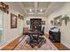Executive office featuring coffered ceiling, natural light, built-in bookcase, and ornate rug at 2429 Kirk Nw Ln, Kennesaw, GA 30152