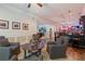 Sitting room with hardwood floors transitions to a bar and game room at 2429 Kirk Nw Ln, Kennesaw, GA 30152