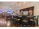 An inviting bar space with great lighting is perfect for entertaining adjacent to a pool table and TV area at 2429 Kirk Nw Ln, Kennesaw, GA 30152