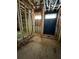Unfinished bathroom showing the framing, plumbing, and shower stall, offering a glimpse of the remodeling potential at 308 Fortune Ne St # A, Atlanta, GA 30312