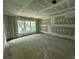 Unfinished bedroom with a large window that provides an abundance of natural light at 308 Fortune Ne St # A, Atlanta, GA 30312