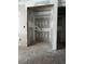 Closet in progress, showing electrical and smooth walls with neutral color scheme in organized space at 308 Fortune Ne St # A, Atlanta, GA 30312