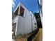 Exterior side of newly constructed white house with a modern architectural style and dark window frames at 308 Fortune Ne St # A, Atlanta, GA 30312