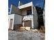 Side view of modern home's exterior showing construction and sleek architectural details at 308 Fortune Ne St # A, Atlanta, GA 30312