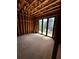 Unfinished living room featuring multi-sliding glass doors and ample natural light at 308 Fortune Ne St # A, Atlanta, GA 30312