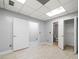 Finished basement featuring tile floors and multiple doorways at 6 Alston Place Ne Ne Pl, Atlanta, GA 30324