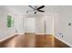 Spacious bedroom featuring hardwood floors, closet, and windows at 6 Alston Place Ne Ne Pl, Atlanta, GA 30324
