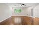 Bedroom featuring hardwood floors, and large windows with natural light at 6 Alston Place Ne Ne Pl, Atlanta, GA 30324