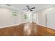 Bedroom with hardwood floors, ceiling fan, closet, and windows at 6 Alston Place Ne Ne Pl, Atlanta, GA 30324