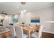 Open dining room with modern lighting, table seating for six, and artwork at 6 Alston Place Ne Ne Pl, Atlanta, GA 30324