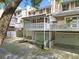 Townhome exterior featuring a mix of neutral siding, garages, and elevated outdoor spaces at 6 Alston Place Ne Ne Pl, Atlanta, GA 30324