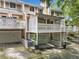 Townhome exterior with garages, outdoor spaces, and neutral siding at 6 Alston Place Ne Ne Pl, Atlanta, GA 30324