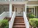 Charming front entrance featuring a brick staircase and well-maintained landscaping at 6 Alston Place Ne Ne Pl, Atlanta, GA 30324
