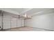 Spacious, well-lit garage with an automatic door provides ample space for parking and storage at 6 Alston Place Ne Ne Pl, Atlanta, GA 30324
