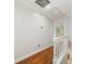 Bright hallway features hardwood floors, fresh paint, and staircase at 6 Alston Place Ne Ne Pl, Atlanta, GA 30324