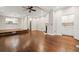 Open-concept living room featuring a fireplace and built-in bar area at 6 Alston Place Ne Ne Pl, Atlanta, GA 30324