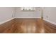 Spacious living room featuring gleaming hardwood floors and ample natural light at 6 Alston Place Ne Ne Pl, Atlanta, GA 30324