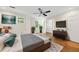 Cozy main bedroom features a ceiling fan, large windows, and modern decor at 6 Alston Place Ne Ne Pl, Atlanta, GA 30324