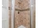 Tiled shower stall featuring modern fixtures and glass door at 6 Alston Place Ne Ne Pl, Atlanta, GA 30324