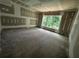 Large bedroom with drywall and a window providing a great view of the outdoors at 308 Fortune Ne St # B, Atlanta, GA 30312