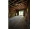 Unfinished bonus room with sliding glass doors and wood framing showing the bones of the new home at 308 Fortune Ne St # B, Atlanta, GA 30312