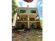 Rear exterior view of a two-story home with sliding glass doors at 308 Fortune Ne St # B, Atlanta, GA 30312