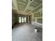 Interior with drywall, a large glass door, and paint supplies ready for finishing at 308 Fortune Ne St # B, Atlanta, GA 30312