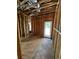 Interior room showing framing with door and window opening for customization at 308 Fortune Ne St # B, Atlanta, GA 30312