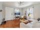 Cozy living room showcasing hardwood floors, modern furnishings, and a ceiling fan at 761 Bellemeade Nw Ave, Atlanta, GA 30318