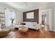Bright living room featuring hardwood floors, stylish decor, and abundant natural light at 761 Bellemeade Nw Ave, Atlanta, GA 30318