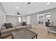 Finished basement features a comfortable living area next to a kitchenette at 2559 Dunhaven Gln, Snellville, GA 30078