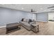 Basement living room featuring neutral colors, wood-look floors, and comfortable seating at 2559 Dunhaven Gln, Snellville, GA 30078