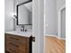 Chic bathroom features a marble countertop, wood cabinets, and a modern sink at 2559 Dunhaven Gln, Snellville, GA 30078