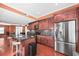 Open concept kitchen with stainless steel appliances, granite counters, and seating at 2670 Trotters Pointe Drive Dr, Snellville, GA 30039