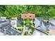 Aerial view of landscaped backyard, featuring beautiful patio, and multi-level hardscape at 328 Stonemont Dr, Atlanta, GA 30305